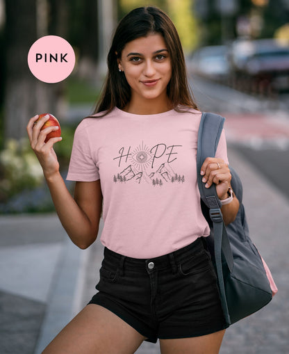 Casual-city-stroll-young-woman-in-Pink-t-shirt-with-long-brown-hair-flowing