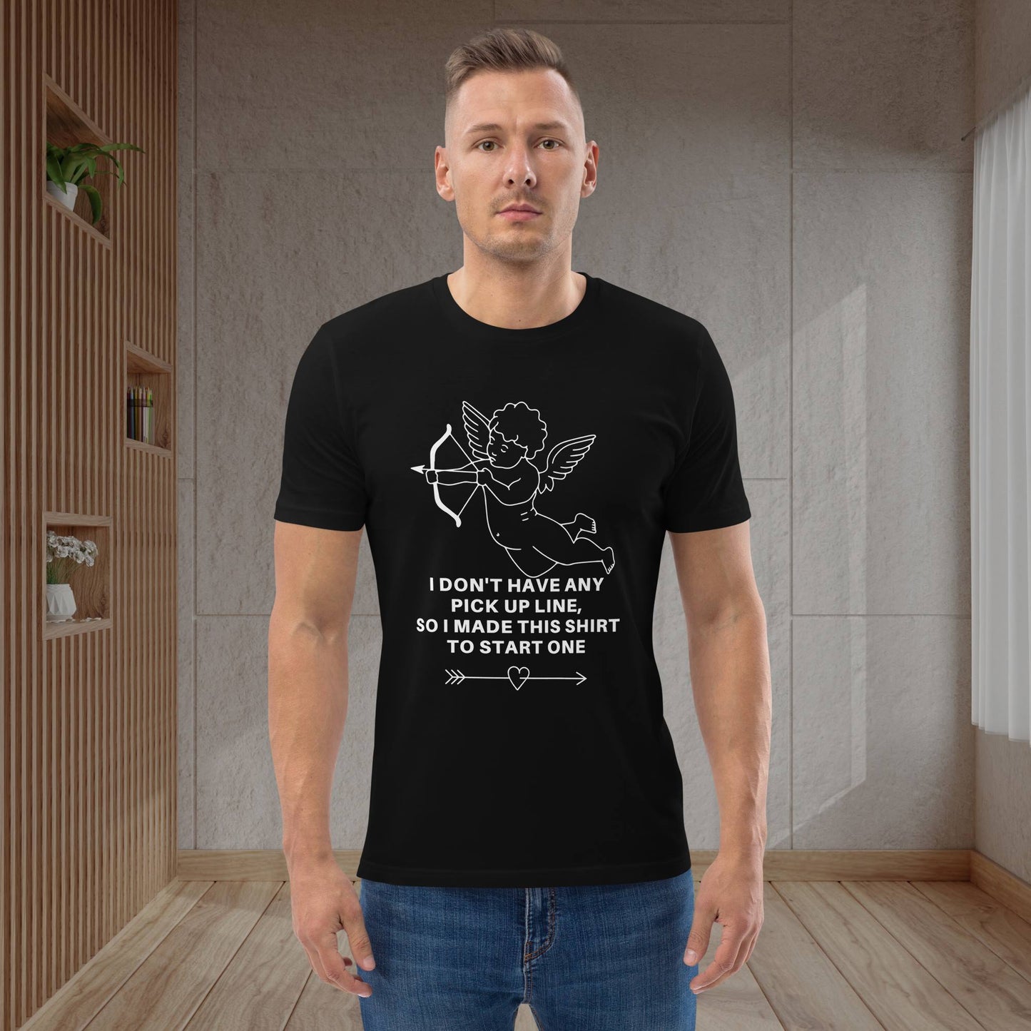 English-man-posing-in-the-living-room-wearing-a-black-t-shirt-printed-with-cute-flirty-pick-up-lines