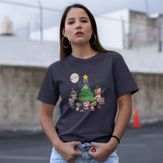 Fashionable-young-woman-in-a-navy-t-shirt-with-fun-holiday-cats-characters-printed-on-the-front-with-a-urban-background