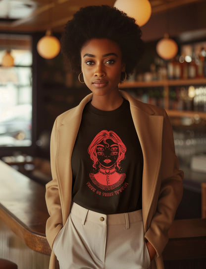 Professional-young-woman-combining-a-black-Halloween-t-shirt-with-a-tan-blazer-in-a-cafe-setting