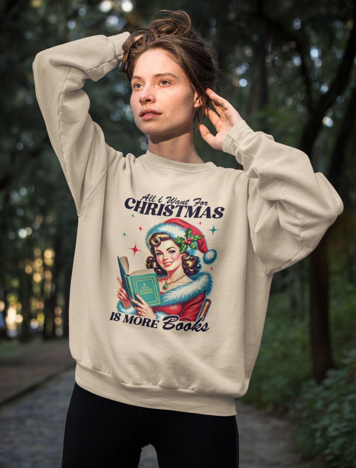 Retro-style-Christmas-sweatshirt-design-for-book-lovers-worn-by-a-woman-in-a-forest