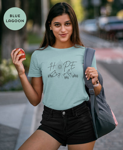 Smiling-young-woman-in-Blue-Lagoon-t-shirt-spreading-positive-vibes-on-a-sunny-street