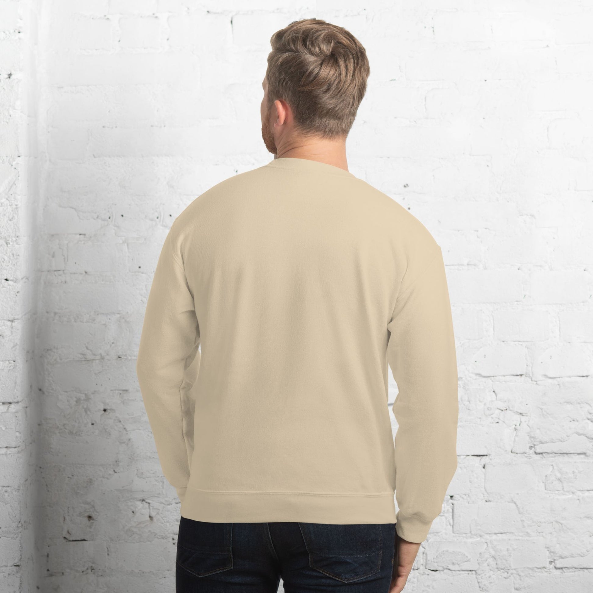 Unisex-sand-crew-neck-sweatshirt-photographed-from-the-back-against-a-clean-white-wall