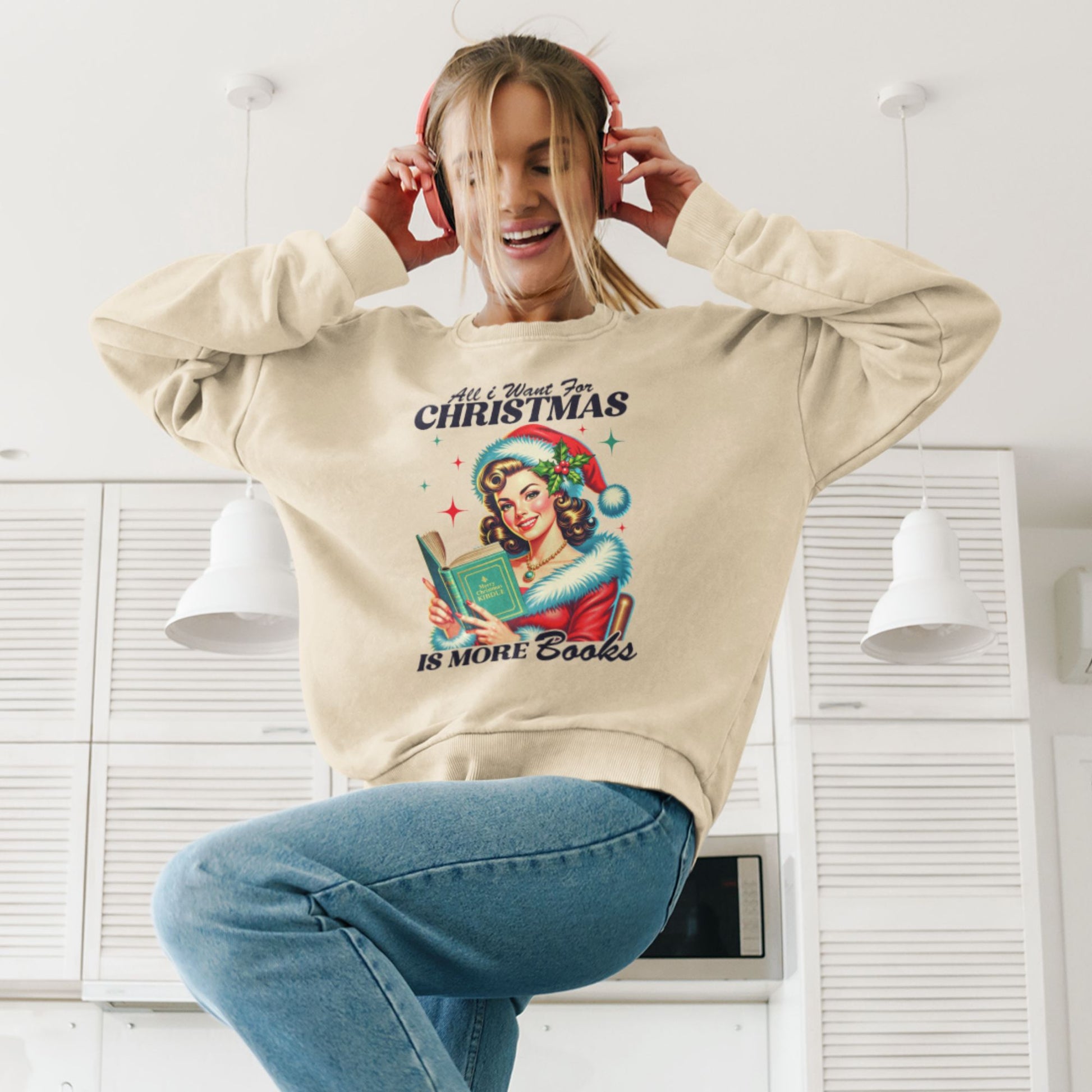 Woman-listening-music-and-dancing-in-a-beige-sweatshirt-featuring-a-festive-book-themed-design-in-modern-living-space-with-clean-lines-in-the-background