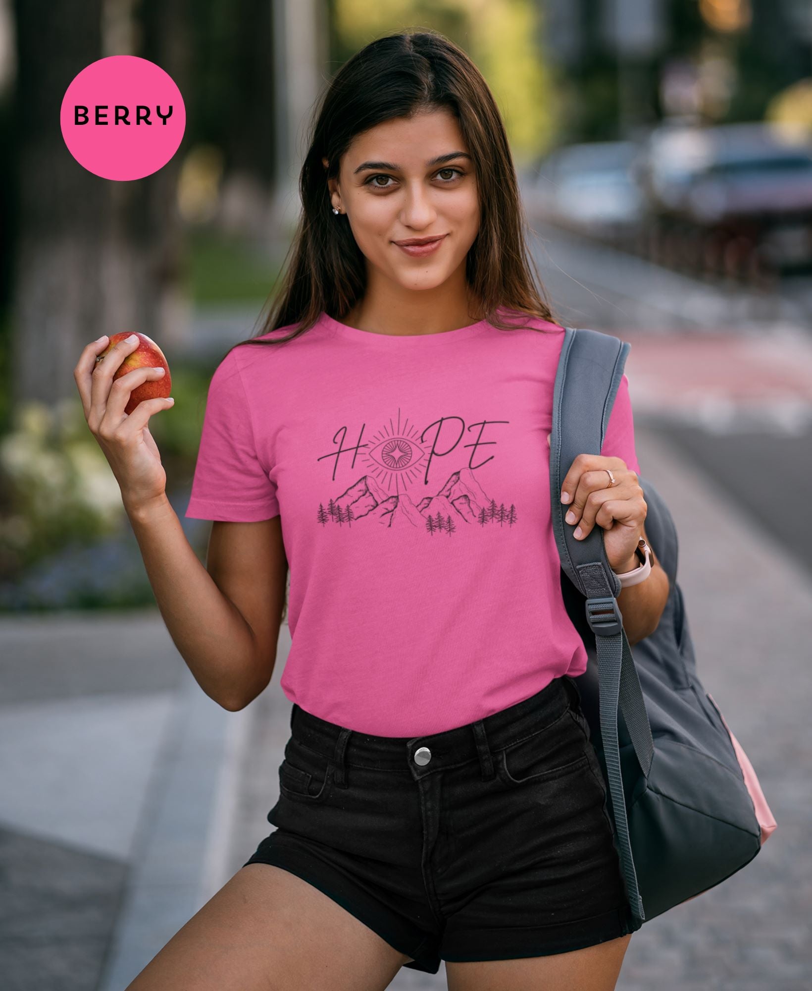 Young-lady-in-high-waisted-shorts-and-Berry-t-shirt-posing-confidently-in-the-city