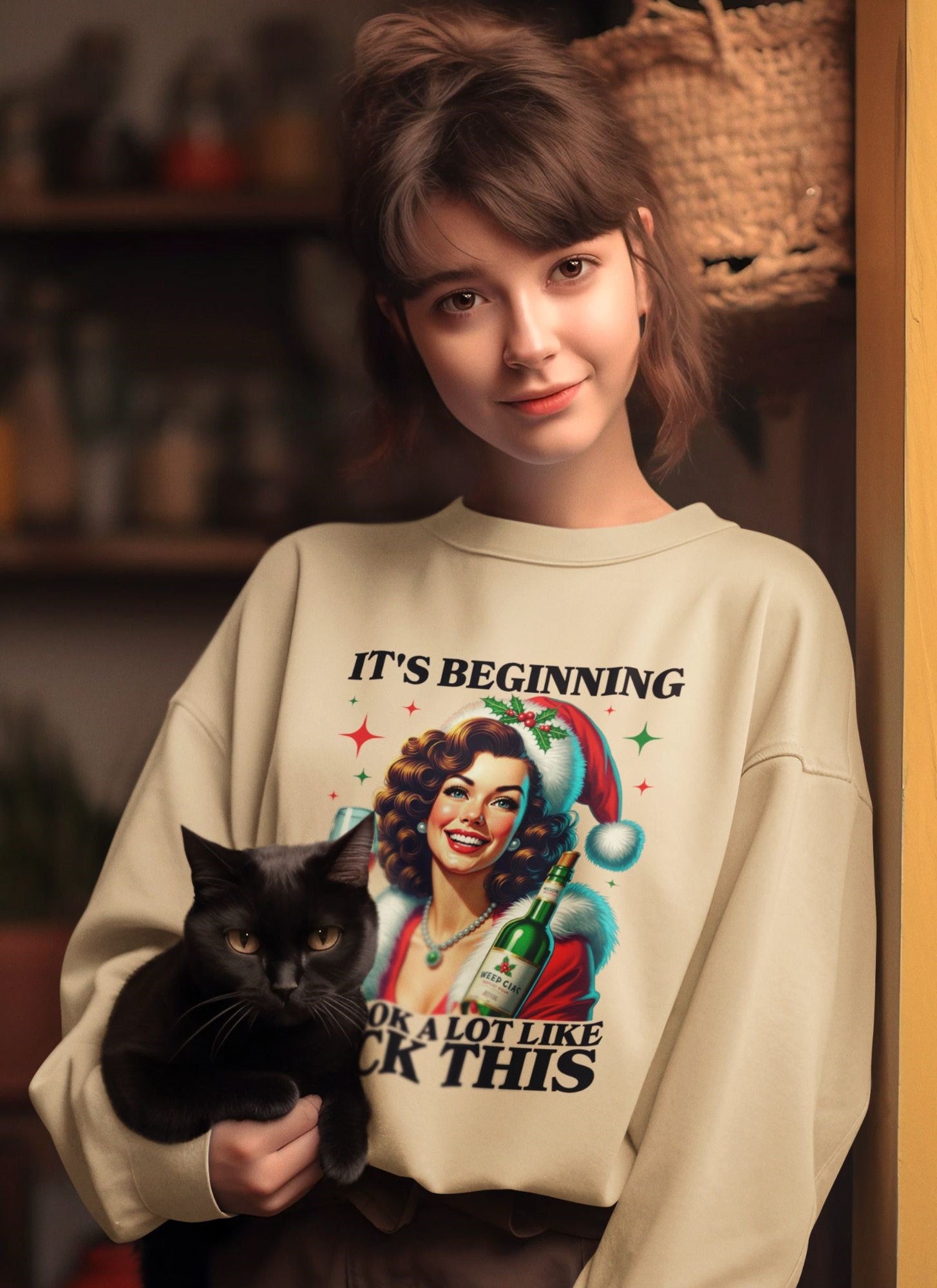 Young-woman-holding-a-black-cat-while-wearing-a-festive-beige-sweatshirt-with-vintage-inspired-Christmas-art