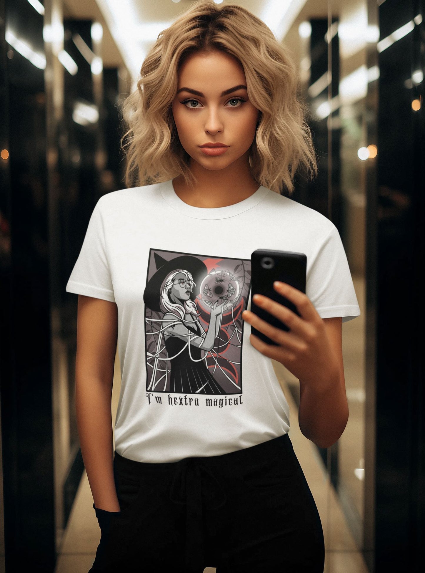 beautiful-blonde-girl-in-a-white-graphic-halloween-t-shirt-with-a-magical-witch-design-taking-a-selfie-in-a-mirror