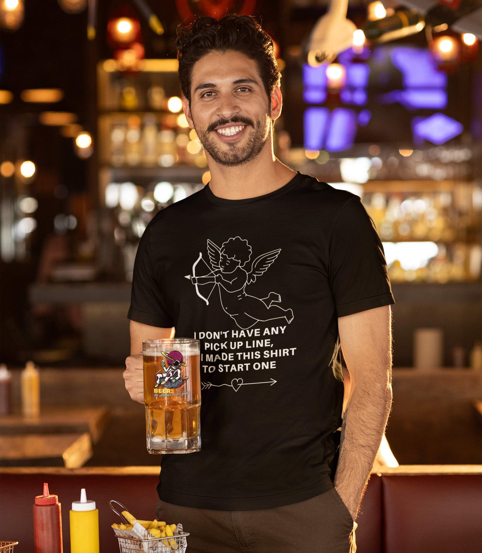 black-eco-tee-mockup-of-a-smiling-bearded-man-holding-a-beer-glass-in-a-bar-by-octomber-fest-party