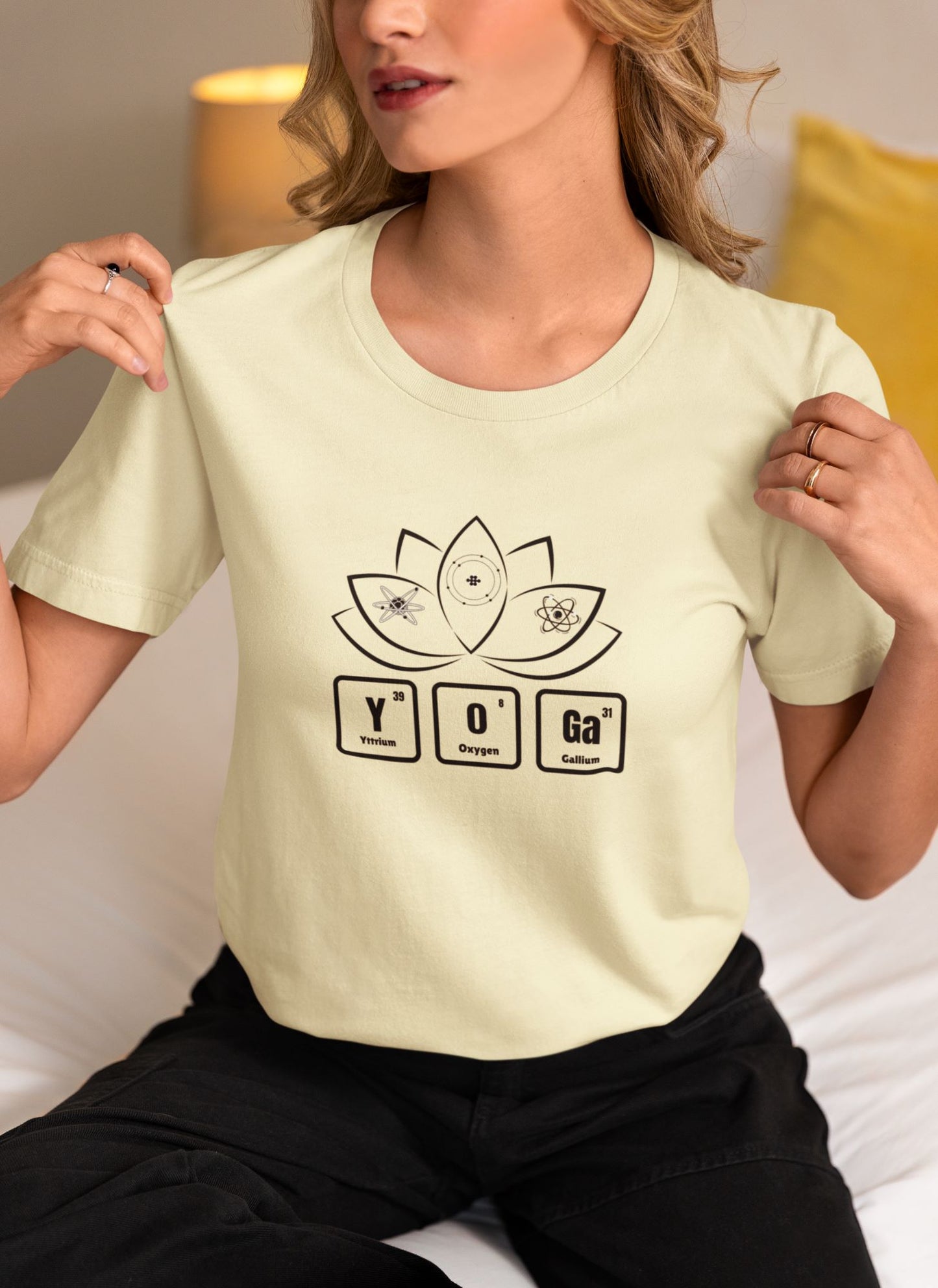 comfy-t-shirt-mockup-of-a-blonde-woman-sitting-on-a-bed