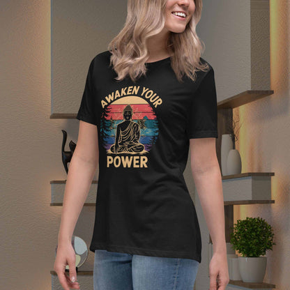 Blonde young lady wearing a black t-shirt with 'Awaken Your Power' design in a home setting
