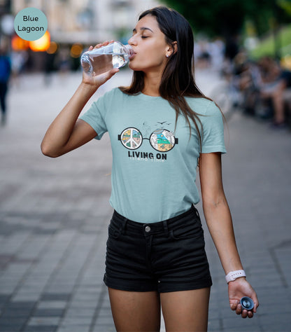 happy-young-woman-posing-for-social-media-wearing-smart-a-watch-and-a-blue-lagoon-t-shirt-with-black-shorts-and-drinking-water