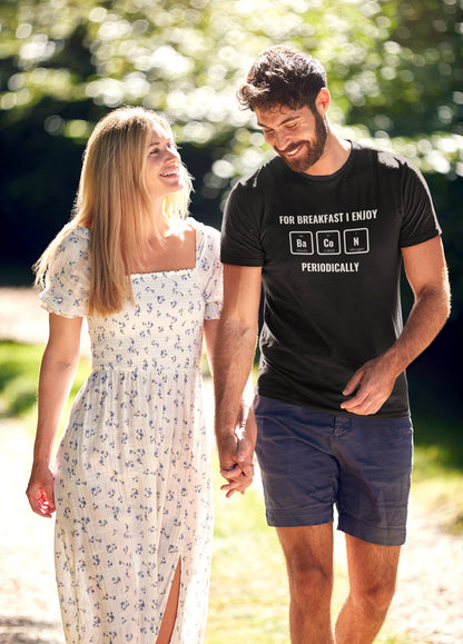 man-wearing-a-black-eco-t-shirt-and-walking-with-his-girlfriend-through-the-city-park