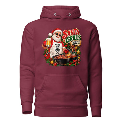 Front view of a maroon pullover hoodie with a pouch pocket and Santa barbecue graphic reading “Santa Grills, the Elves Clean Up.”