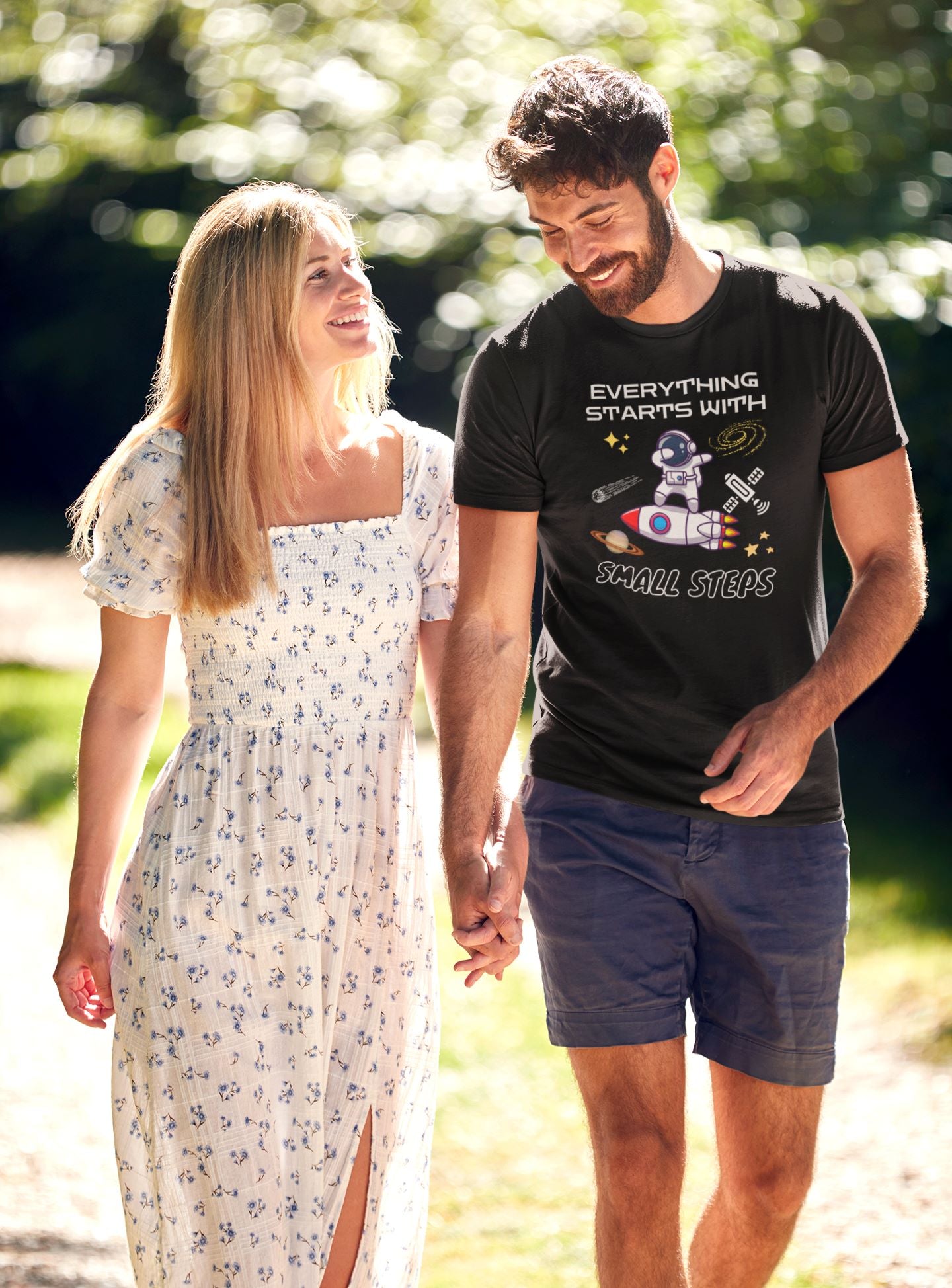 mockup-of-a-man-wearing-a-motivational-t-shirt-and-walking-with-his-girlfriend-in-small-steps-while-talking