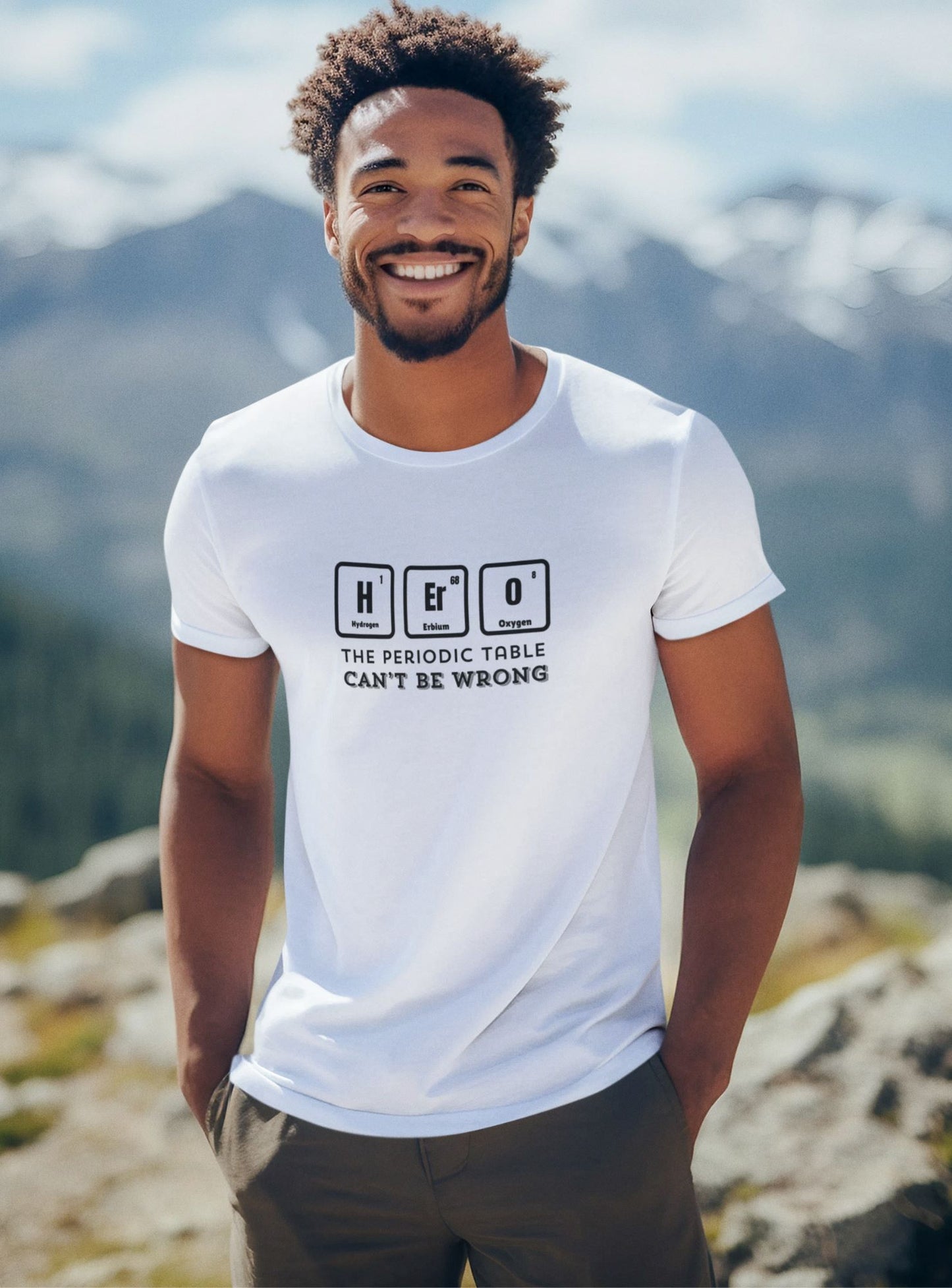 mockup-of-a-smiling-man-wearing-a-organic-white-t-shirt-at-the-top-of-a-mountains-Alps