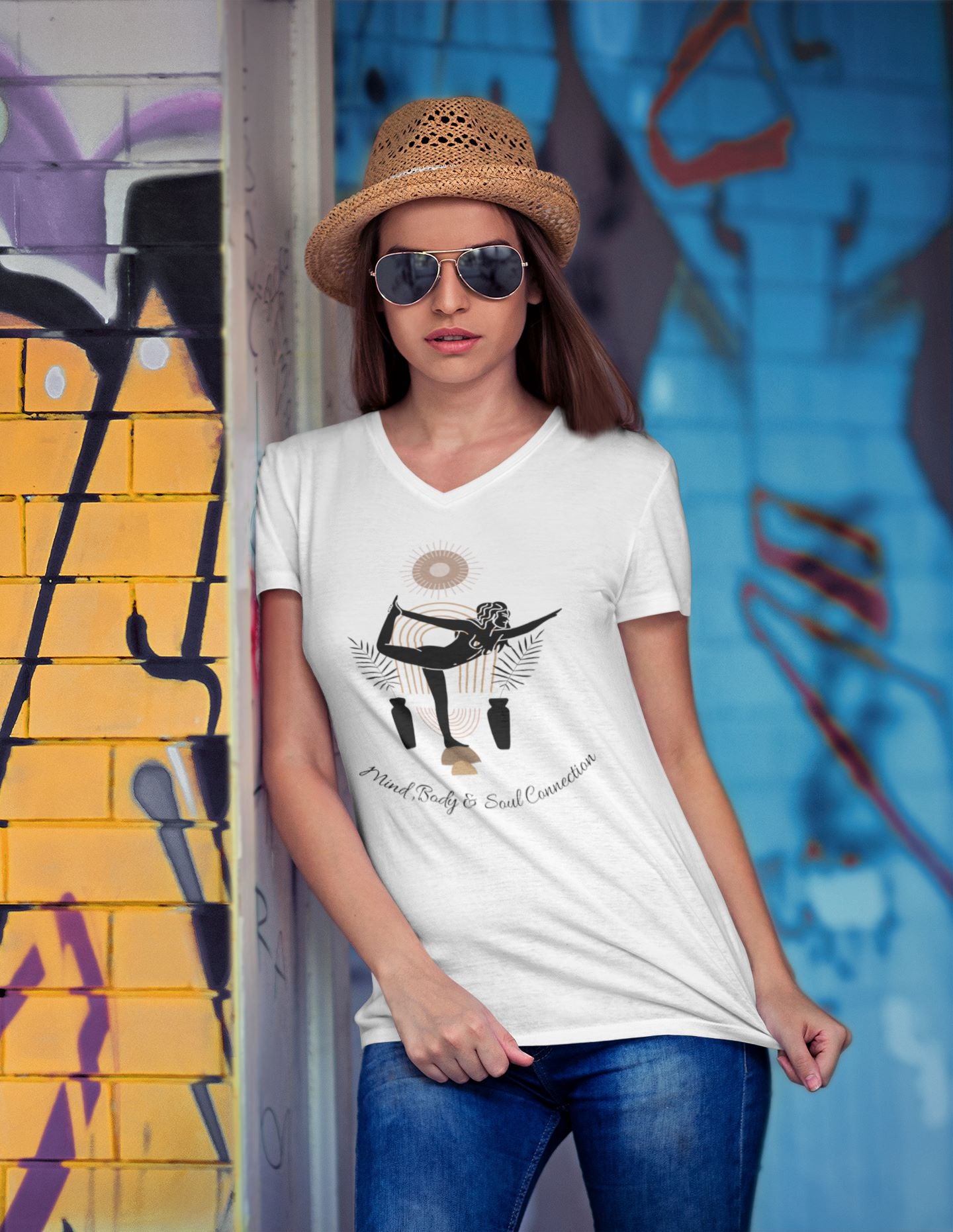 mockup-of-a-woman-wearing-a-v-neck-t-shirt-and-posing-by-graffitied-walls-in-the-suburbs-of-New-York-City