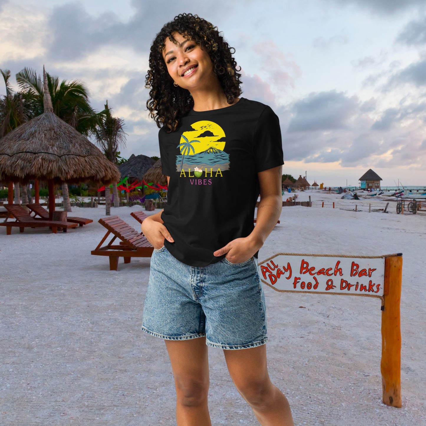 mockup-t-shirt-of-a-happy-curly-woman-walking-on-the-miami-beach