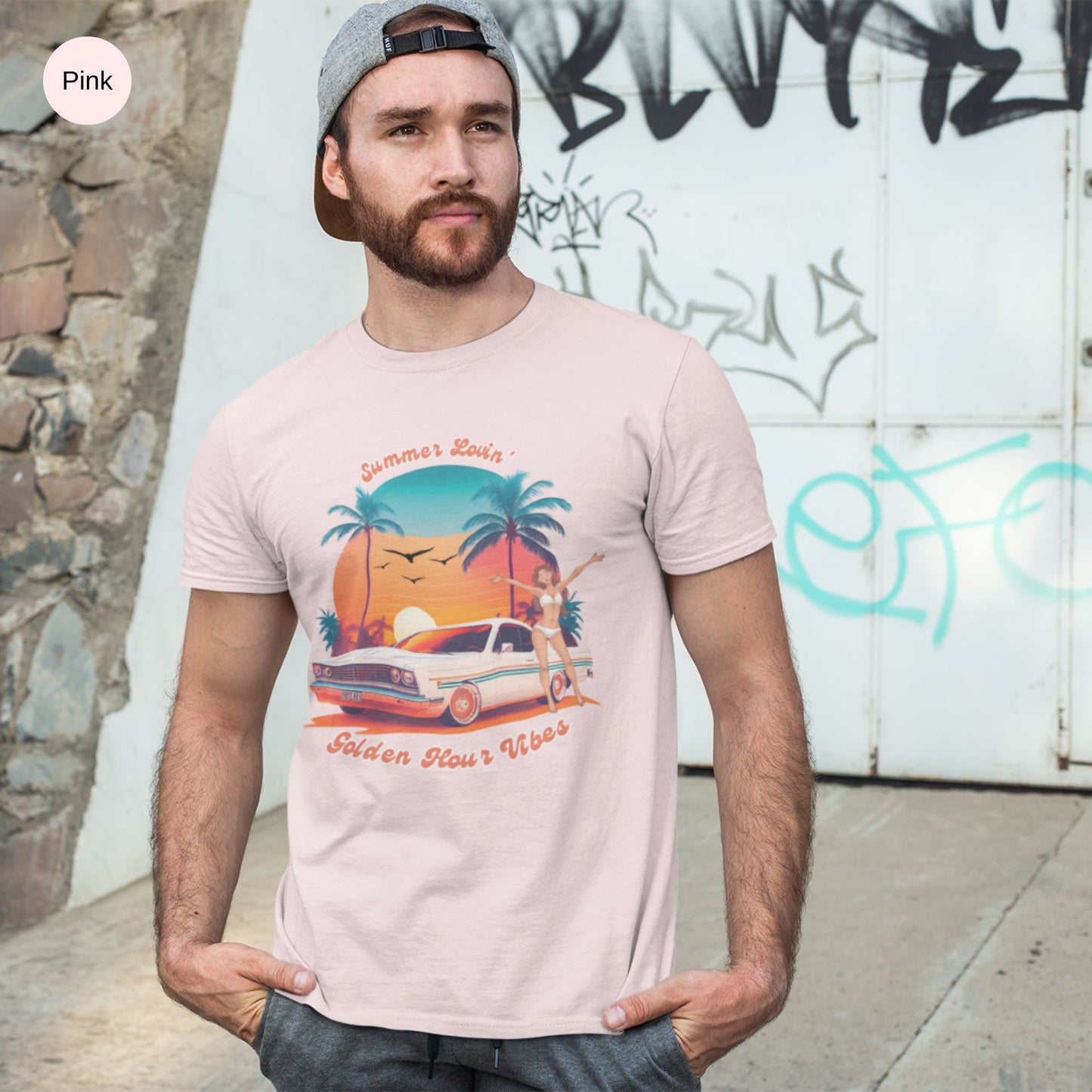 pink-retro-summer-t-shirt-mockup-of-a-man-posing-in-front-of-a-graffiti-wall