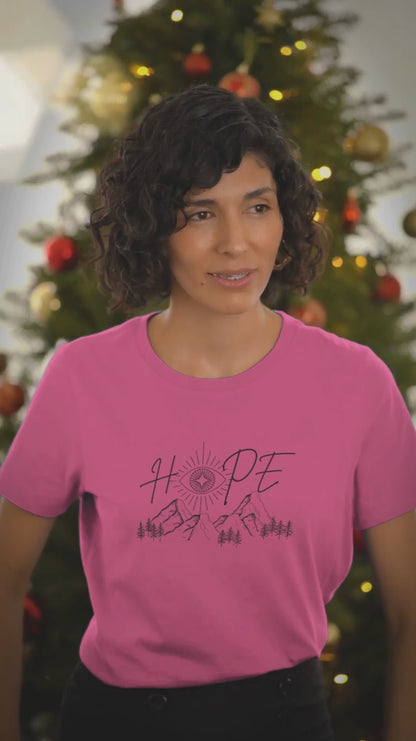 Round-Neck-Berry-Tee-Video-Featuring-A-Smiling-Woman-Posing-Against-A-Christmas-Tree