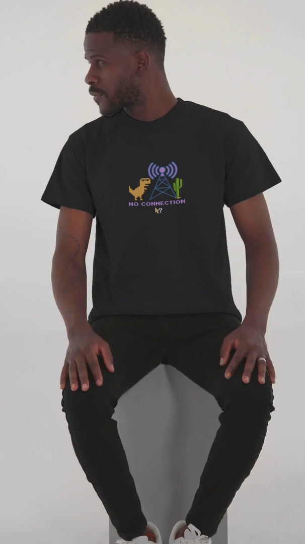 Black-Funny-T-Shirt-Video-Featuring-A-Serious-Man-Sitting-On-A-Stool