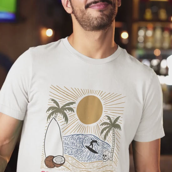 T-Shirt-Video-Mockup-Of-A-Happy-Bearded-Man-With-A-Beer-In-A-Beach-Restaurant