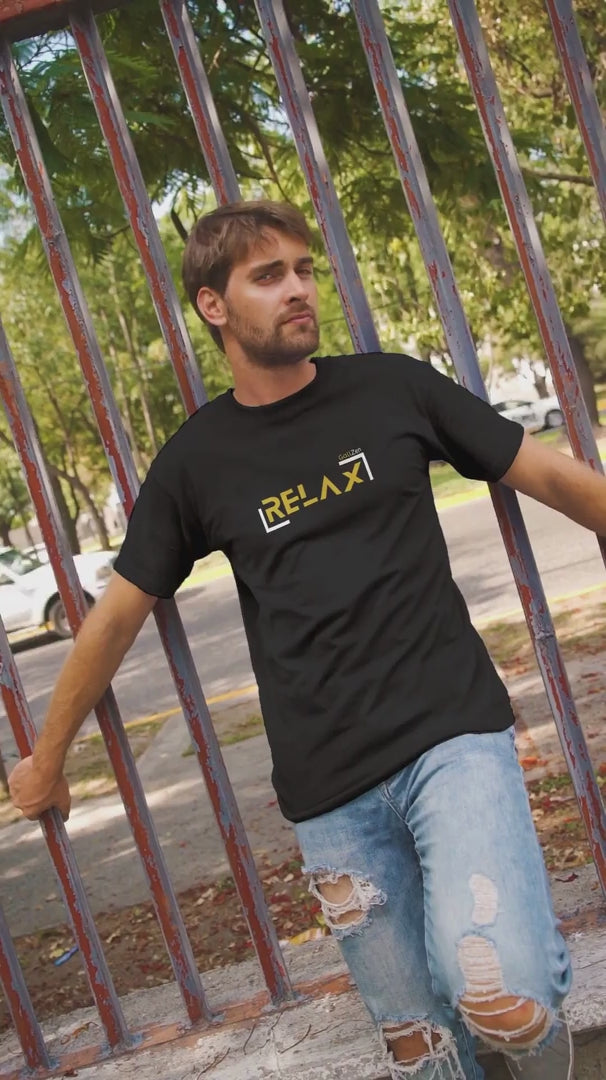 Video-T-Shirt-Design-Of-A-Man-Posing-By-An-Urban-Fence