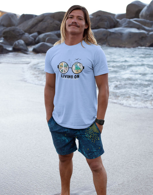 t-shirt-mockup-of-a-blonde-long-haired-man-barefoot-at-the-california-beach