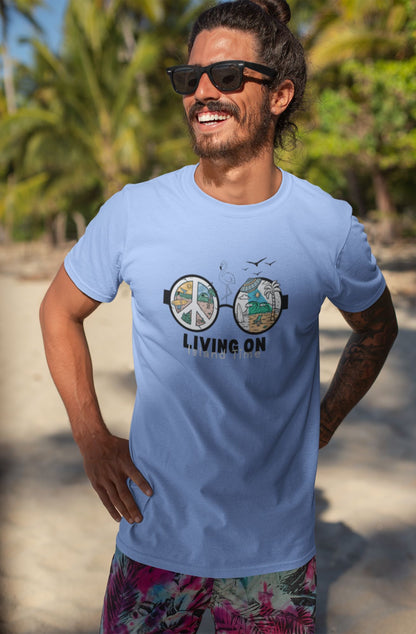 t-shirt-mockup-of-a-smiling-man-with-sunglasses-by-the-exotic-beach
