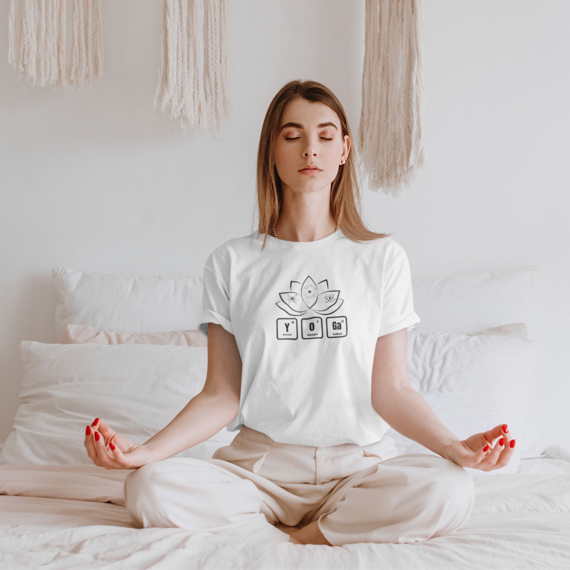 t-shirt-mockup-of-a-spiritual-woman-meditating-in-a-white-minimalist-bedroom