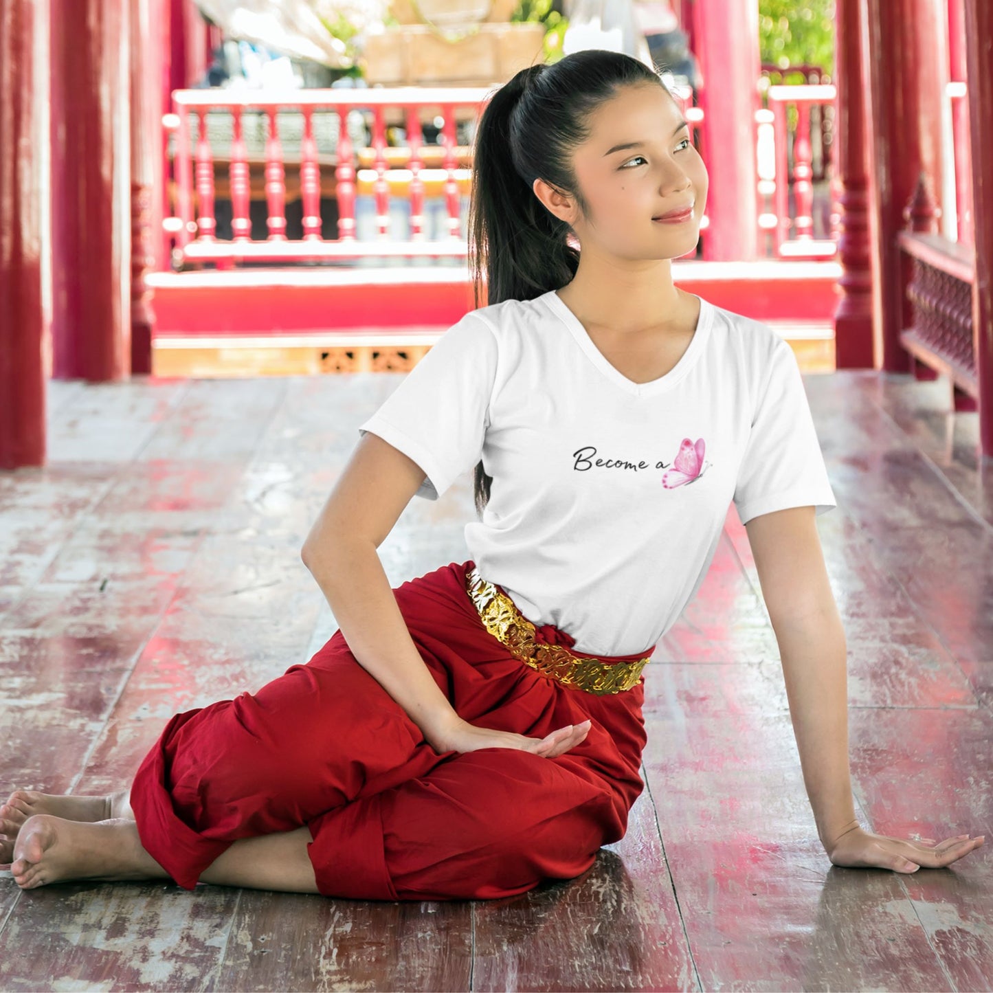 v-neck-t-shirt-mockup-of-a-young-woman-posing-in-a-buddist-thailand-temple