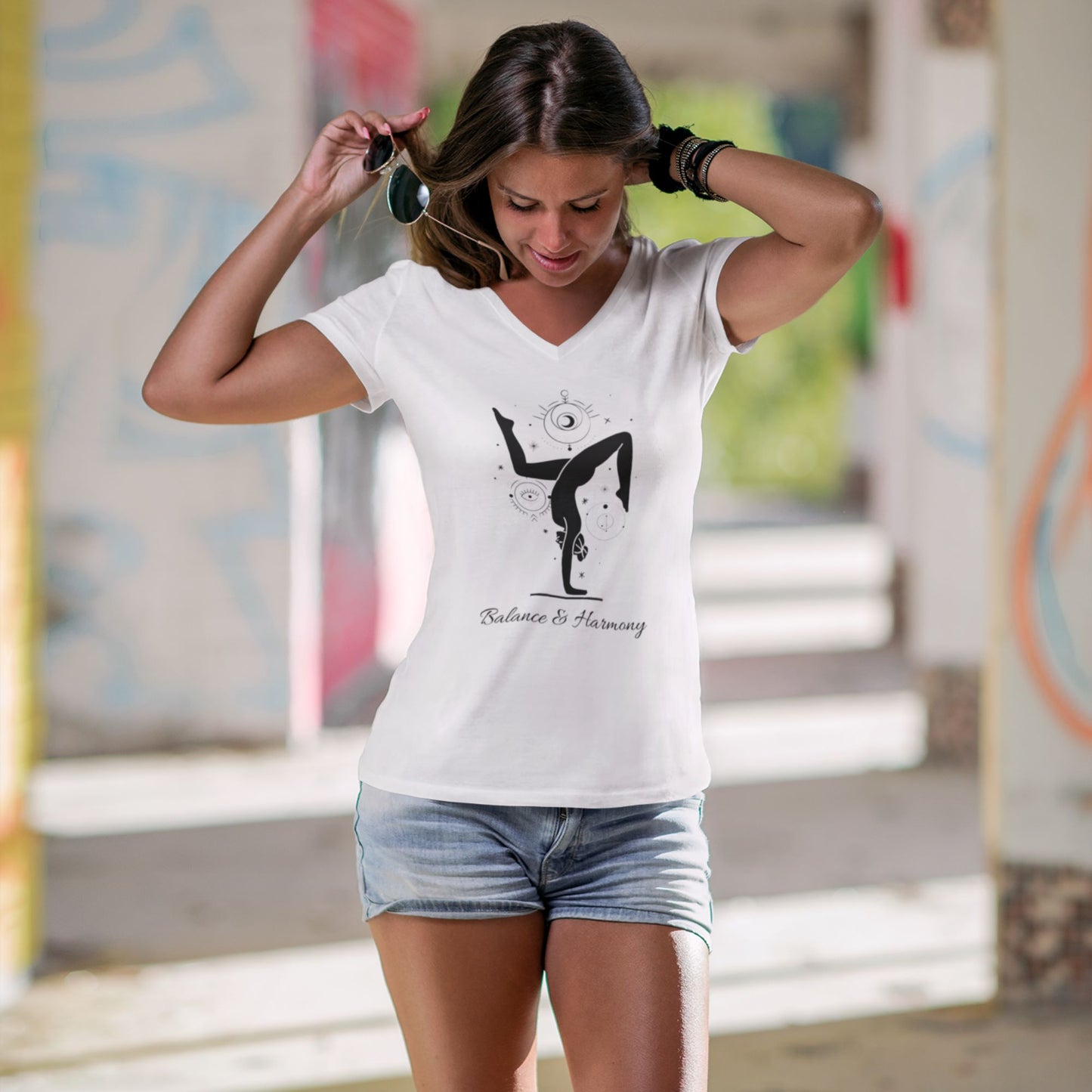 white-v-neck-t-shirt-printed-with-a-yoga-design-about-balance-and-harmony