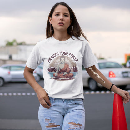 A woman wearing a white t-shirt with a serene, meditative graphic, standing confidently in an urban setting, reflecting inner peace.