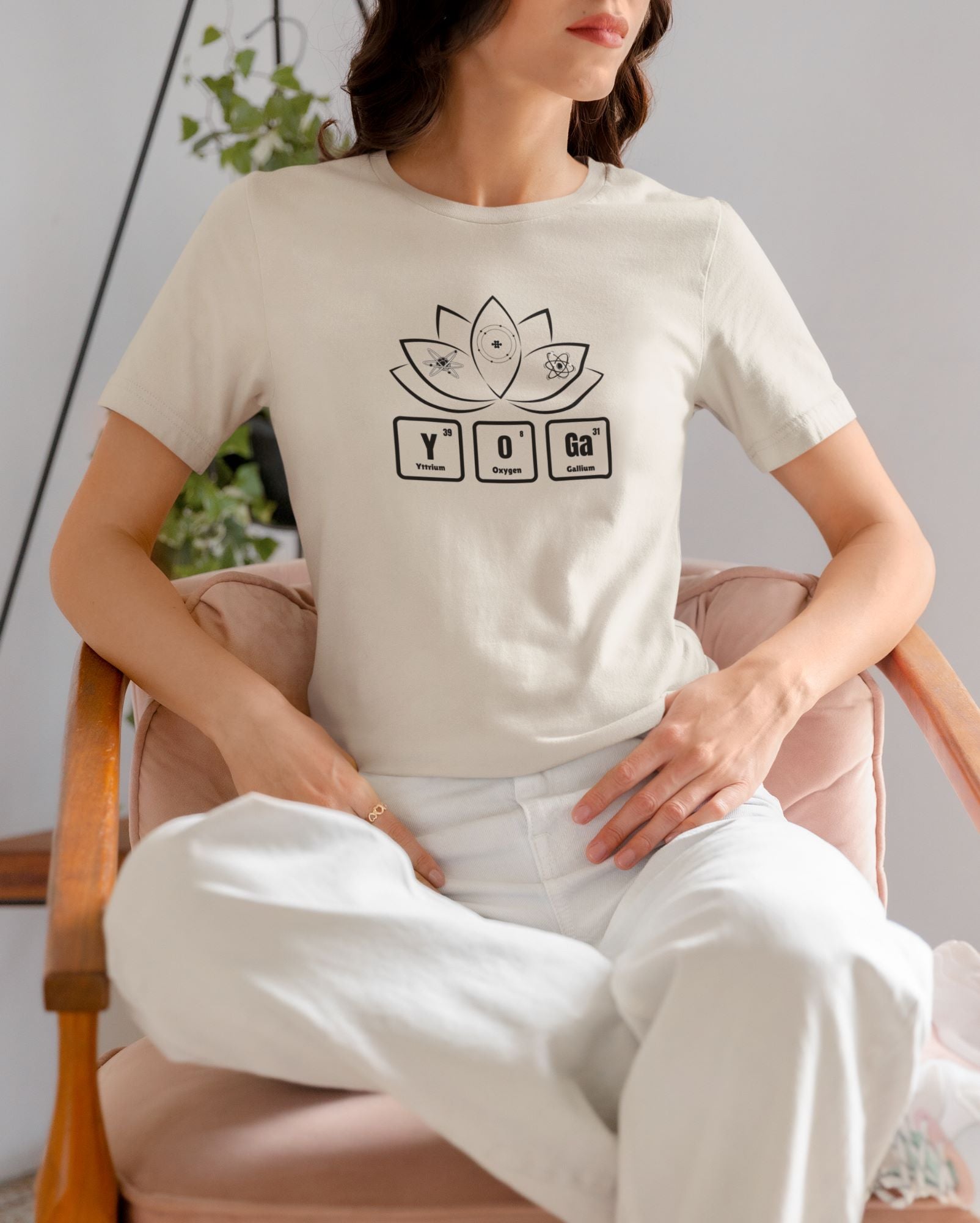 yoga-t-shirt-mockup-of-a-woman-sitting-on-a-chair